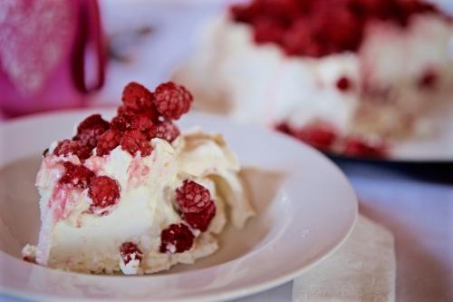 Piece of raspberry pavlova on a plate - Australian Stock Image