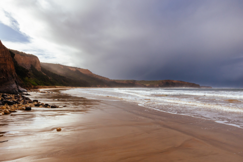 Point Addis Beach and ocean on a stormy cool autumn day near Torquay, Victoria, Australia - Australian Stock Image