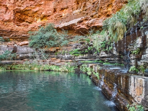 Pool and waterfall in remote location - Australian Stock Image