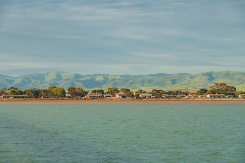 Port Germein and Mount Remarkable viewed from the sea - Australian Stock Image