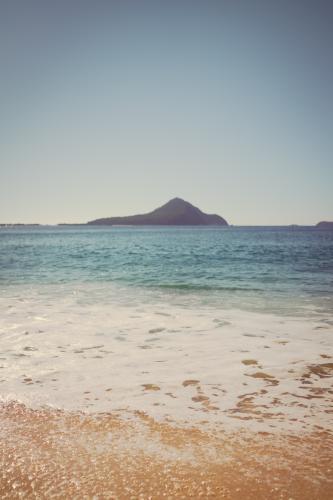 Port Stephens beach on the NSW Mid North Coast. Focus on bubbles in foreground