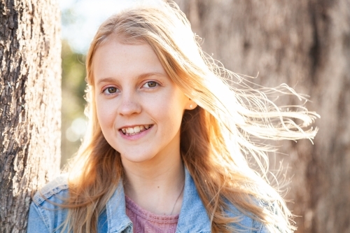 Portrait of a blond female teen outside - Australian Stock Image