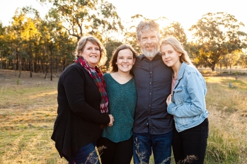 Portrait of a happy family, parents and teenage children - Australian Stock Image