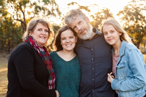 Portrait of a happy family, parents and teenage children - Australian Stock Image