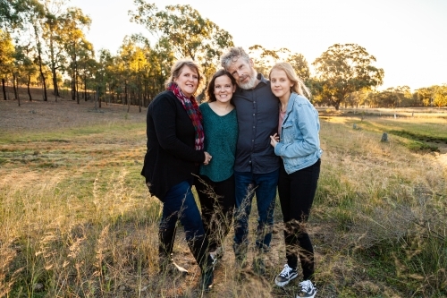 Portrait of a happy family, parents and teenage children - Australian Stock Image