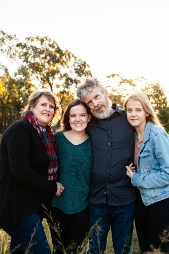 Portrait of a happy family, parents and teenage children - Australian Stock Image
