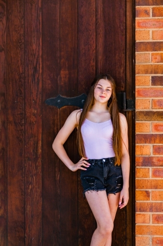 Portrait of a happy teen girl outside - Australian Stock Image