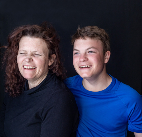 Portrait of a mother and son laughing - Australian Stock Image