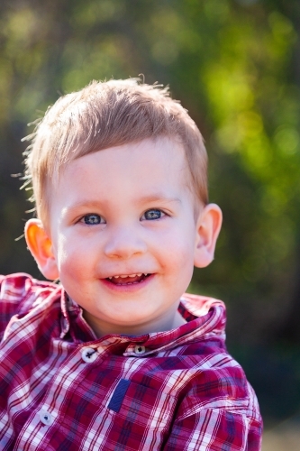 Portrait of a smiling little boy - Australian Stock Image