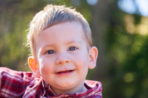 Portrait of a smiling little boy - Australian Stock Image
