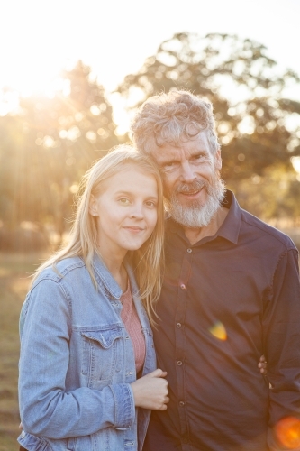 Portrait of a smiling man and his daughter - Australian Stock Image