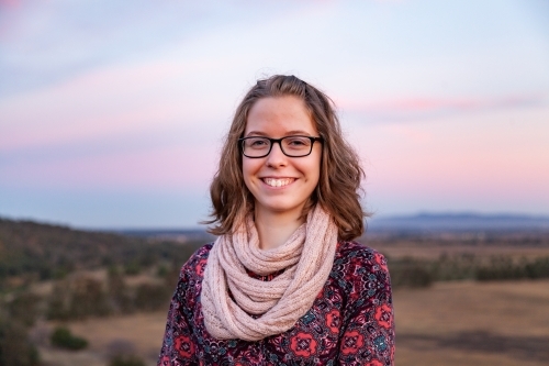 Portrait of a teen woman with pastel coloured background - Australian Stock Image
