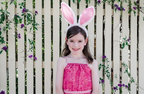 Portrait of a young girl wearing bunny rabbit ears