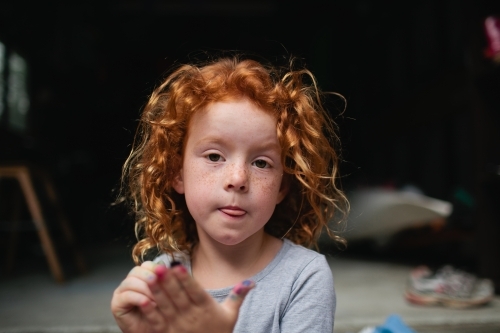 Portrait of a young girl with a serious expression - Australian Stock Image