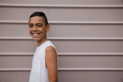 Portrait of a young, smiling first nations boy - Australian Stock Image