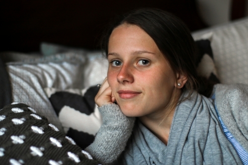 Portrait of a young teenage girl indoors - Australian Stock Image
