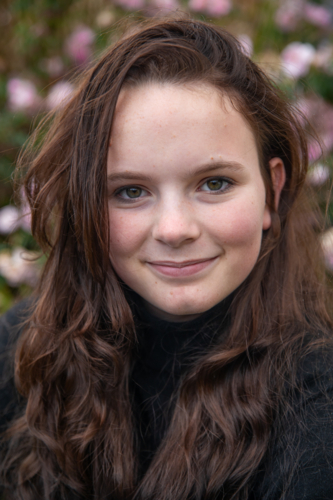 Portrait of a young woman with long hair - Australian Stock Image