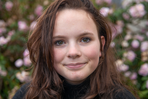 Portrait of a young woman with long hair - Australian Stock Image