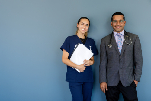 Portrait of doctor and nurse smiling - Australian Stock Image