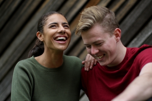 Portrait of happy young mixed race couple