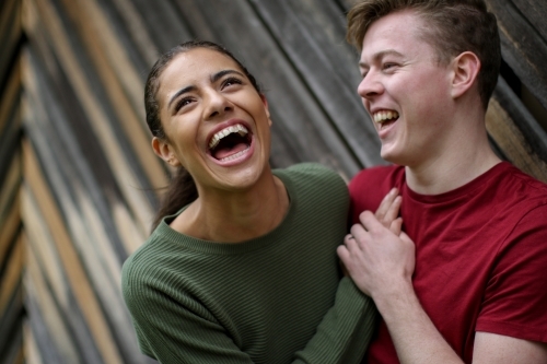 Portrait of happy young mixed race couple - Australian Stock Image