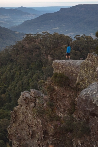 Portrait of man overlooking mountains - Australian Stock Image