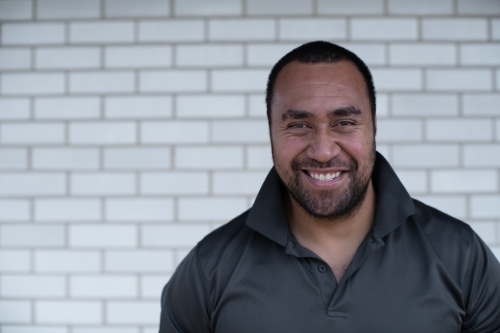 Portrait of man smiling - Australian Stock Image
