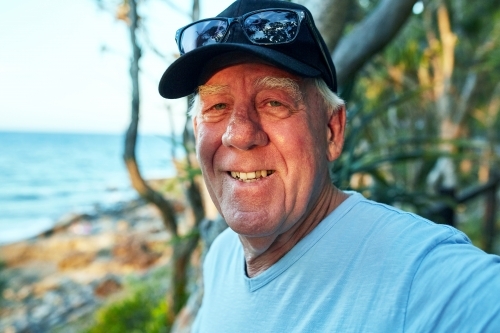 Portrait of middle aged man at the beach - Australian Stock Image