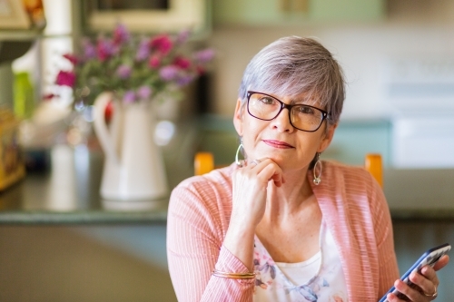Portrait of middle aged woman with glasses - Australian Stock Image