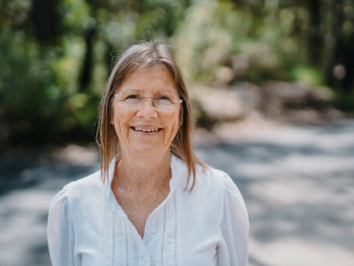 Portrait of senior woman enjoying a healthy lifestyle in nature - Australian Stock Image