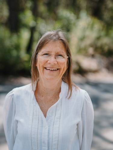 Portrait of senior woman enjoying a healthy lifestyle in nature - Australian Stock Image