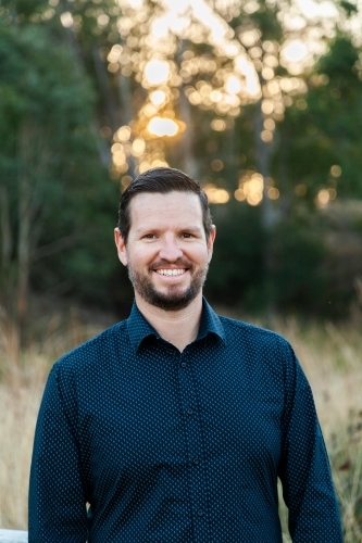 Portrait of well-dressed man standing in the bushland - Australian Stock Image