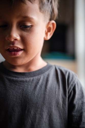 Portrait of young Aboriginal boy - Australian Stock Image