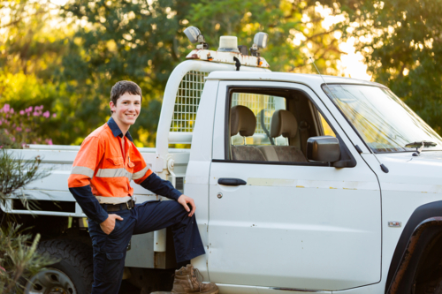 Portrait of young Australian teen bloke with his ute in Australian countryside - Australian Stock Image