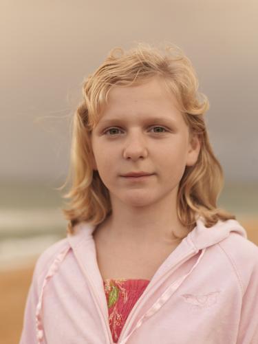 Portrait of young blonde girl
