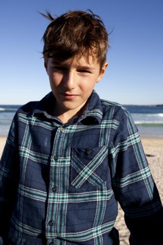 Portrait of young boy at the beach - Australian Stock Image