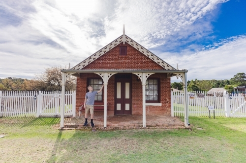Pre-teen boy exploring historic building in the gold mining town of Hill End - Australian Stock Image