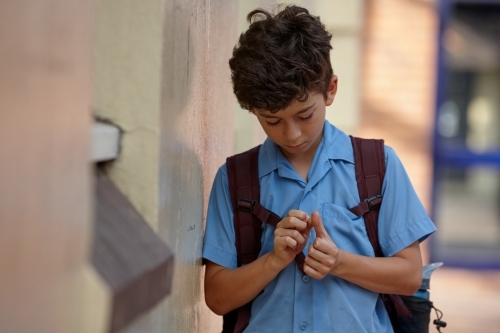 Primary school student at school - Australian Stock Image