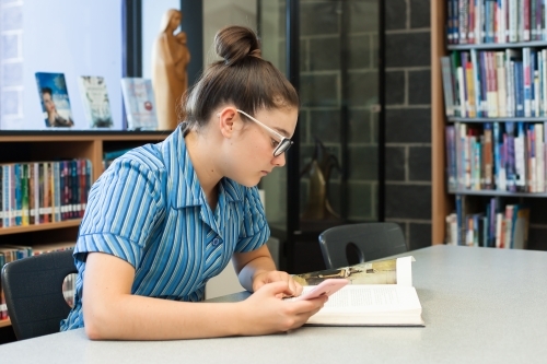 private girls school student studying in the library