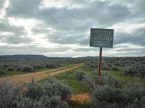 Private property sign near remote track - Australian Stock Image