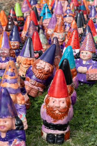 Quirky colourful painted gnomes - Australian Stock Image