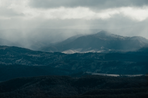 Rain clouds rolling into the Megalong Valley from Cahill's Lookout, Blue Mountains. - Australian Stock Image