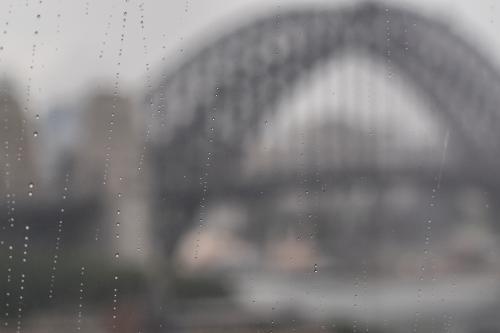 Rain running down window in Sydney