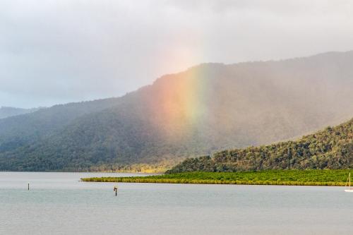 Rainbow over Trinity Inlet - Australian Stock Image