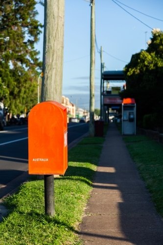 Red post box on Australian street - Australian Stock Image