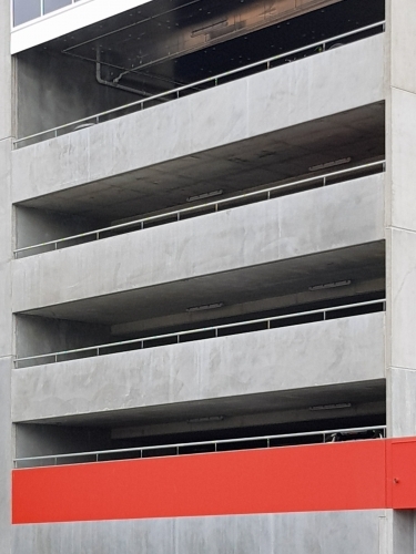 Red stripe on concrete facade
