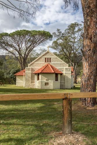Reedy Creek country church among trees in the bush - Australian Stock Image