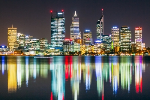 Reflection of the Perth's city lights looking across the Swan River - Australian Stock Image
