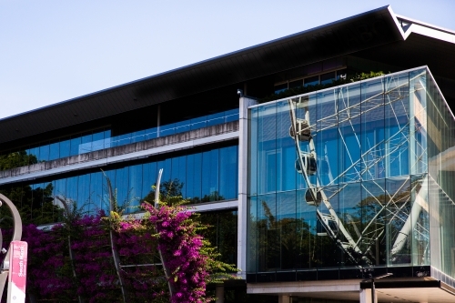 reflection of the wheel at south bank onto a nearby building - Australian Stock Image