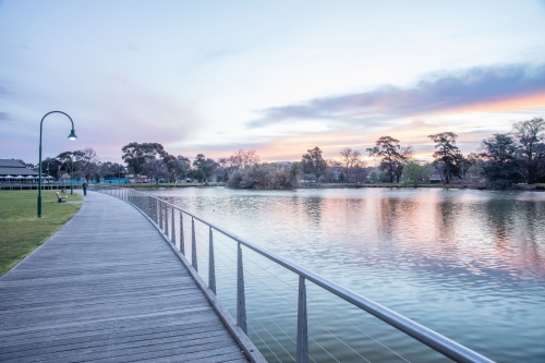 Reflections on Lake Weeroona boardwalk at dusk - Australian Stock Image